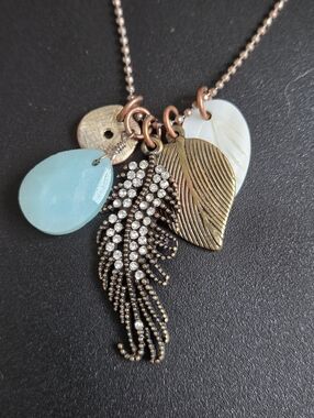 Elegant Multi-Charm Necklace with Crystals